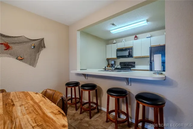 $275,000 | 31347 Northshore Drive, Unit 101A, Rocky Mount, MO 65072