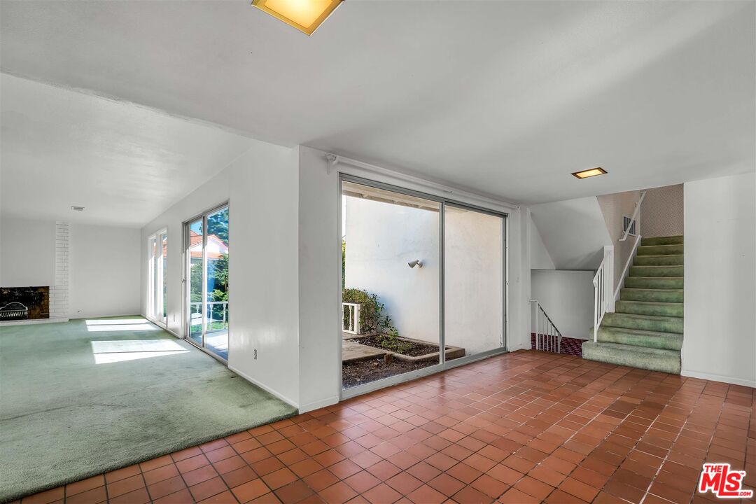 29636 Stonecrest Road Rancho Palos Verdes, CA 90275 - Photo 11 of 32 a view of a room with wooden floor and stairs