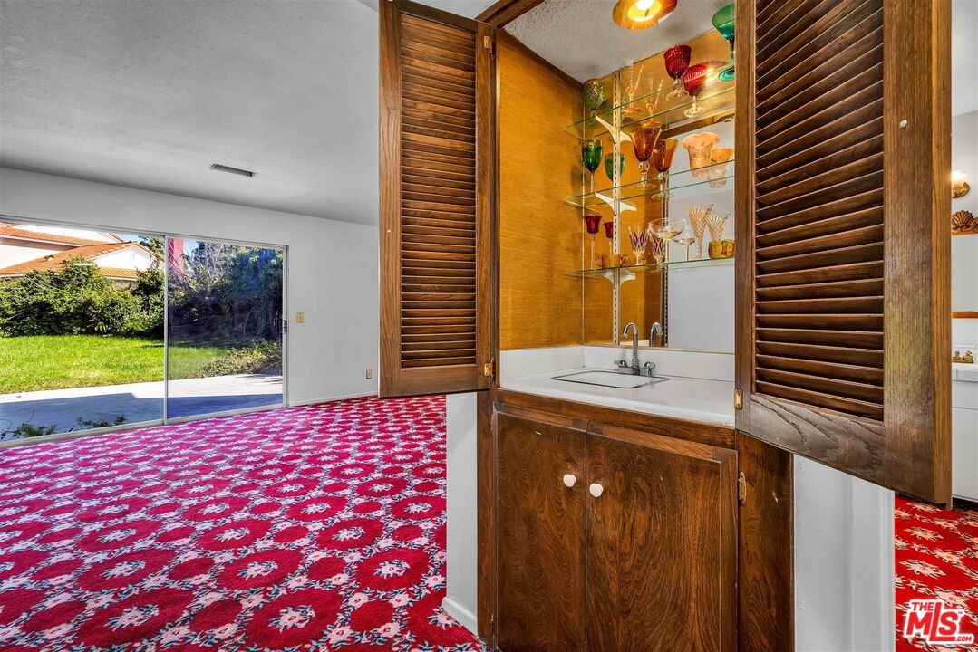 29636 Stonecrest Road Rancho Palos Verdes, CA 90275 - Photo 16 of 32 a view of a bathroom with a sink and a mirror