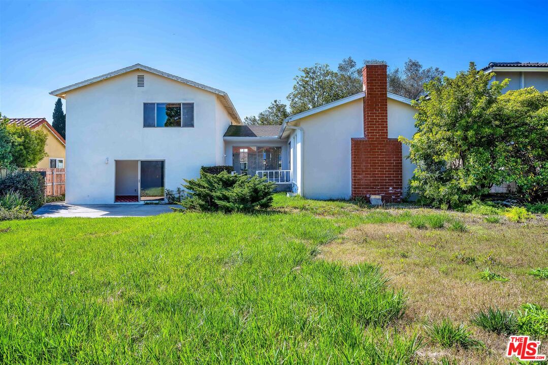 29636 Stonecrest Road Rancho Palos Verdes, CA 90275 - Photo 25 of 32 a front view of a house with garden