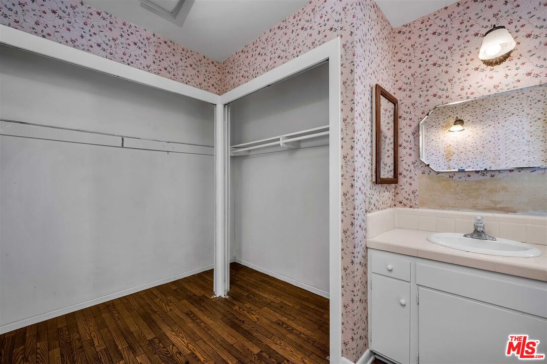 29636 Stonecrest Road Rancho Palos Verdes, CA 90275 - Photo 30 of 32 a bathroom with a sink and a mirror