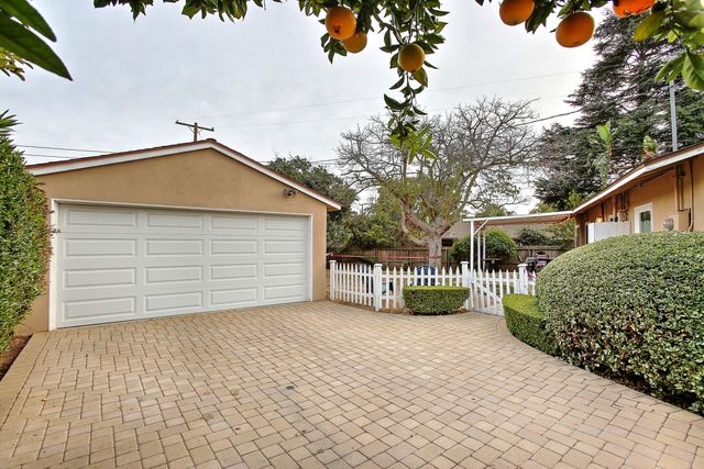 a view of a house with a garage