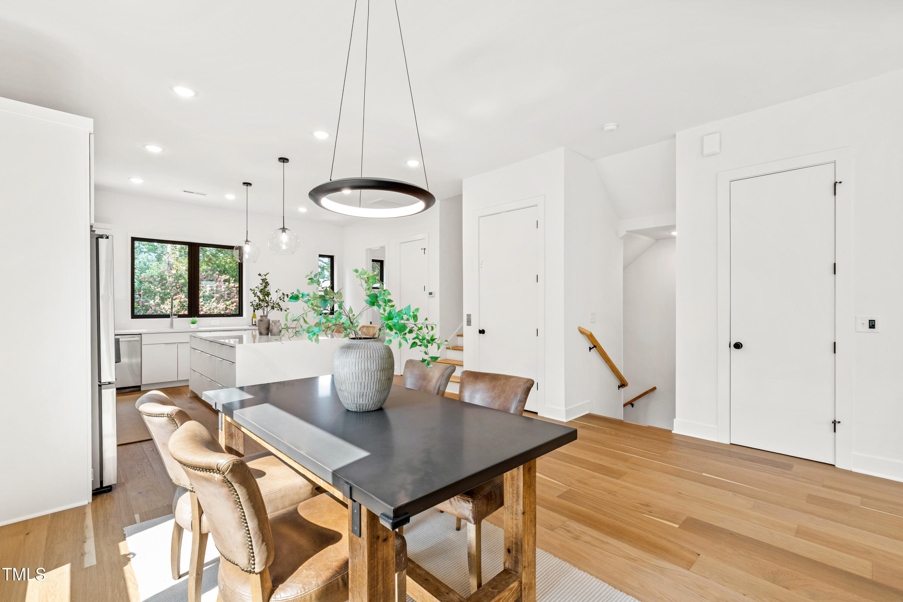 511 Edgecreek Court Raleigh, NC 27604 - Photo 21 of 58 a view of a dining room with furniture and window