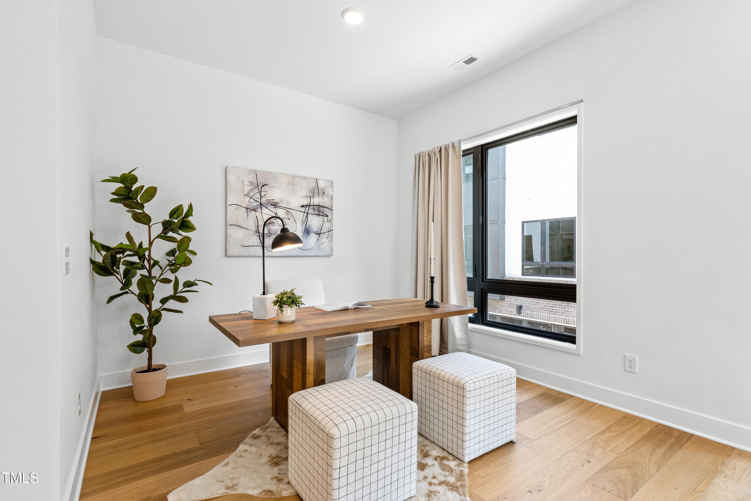 511 Edgecreek Court Raleigh, NC 27604 - Photo 22 of 58 a dining room with furniture and wooden floor