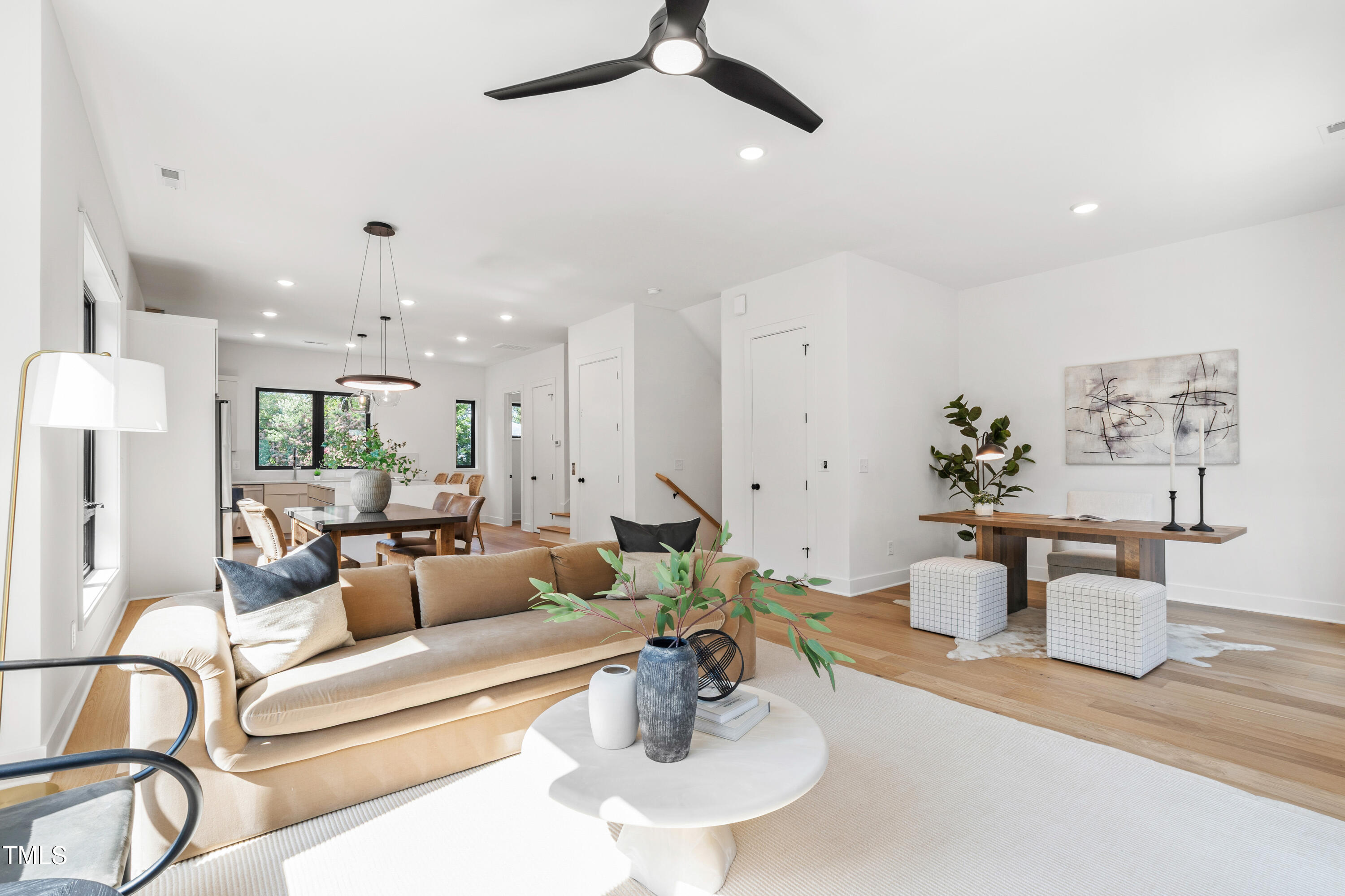 511 Edgecreek Court Raleigh, NC 27604 - Photo 25 of 58 a living room with furniture and a chandelier