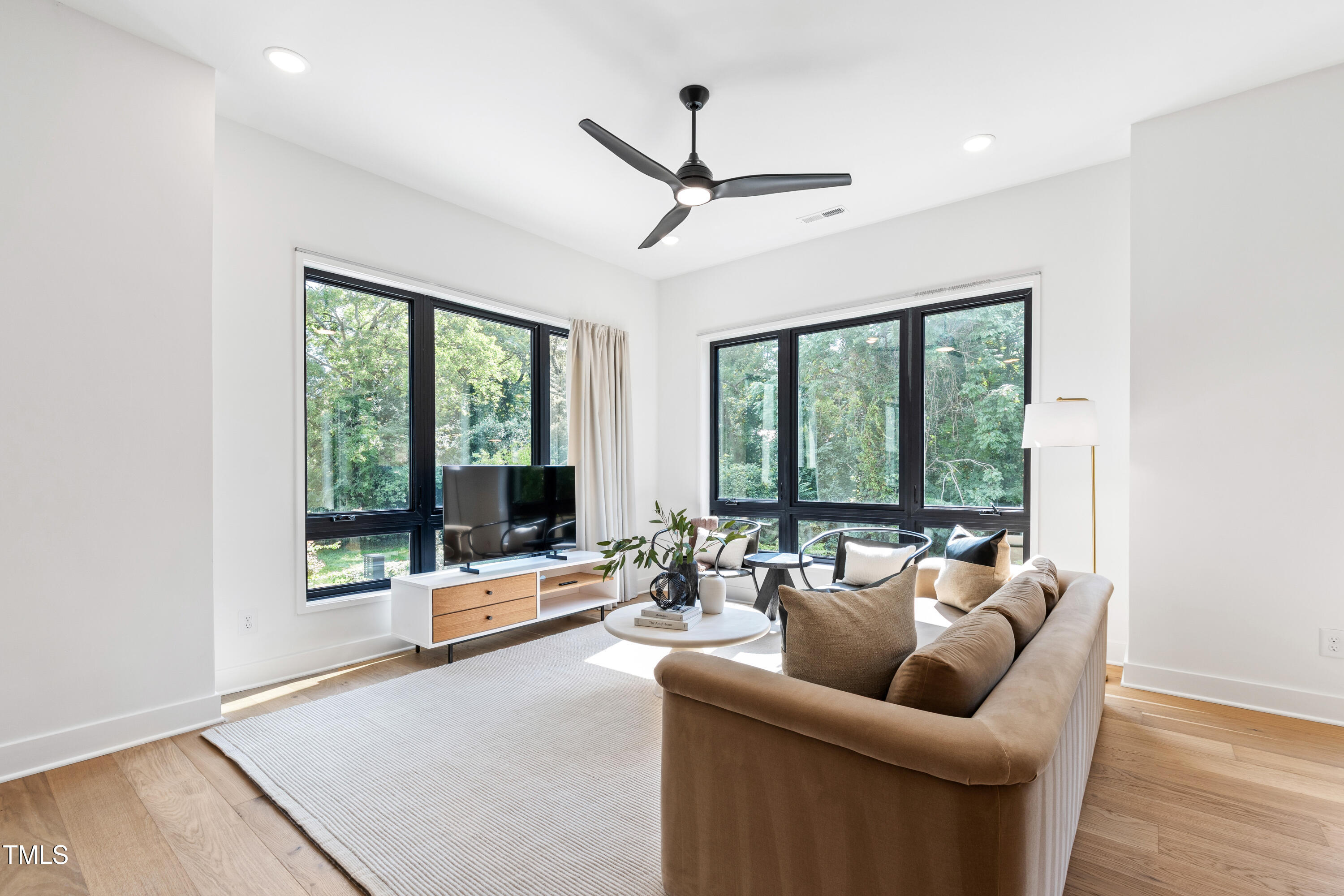 511 Edgecreek Court Raleigh, NC 27604 - Photo 26 of 58 a living room with furniture and a large window