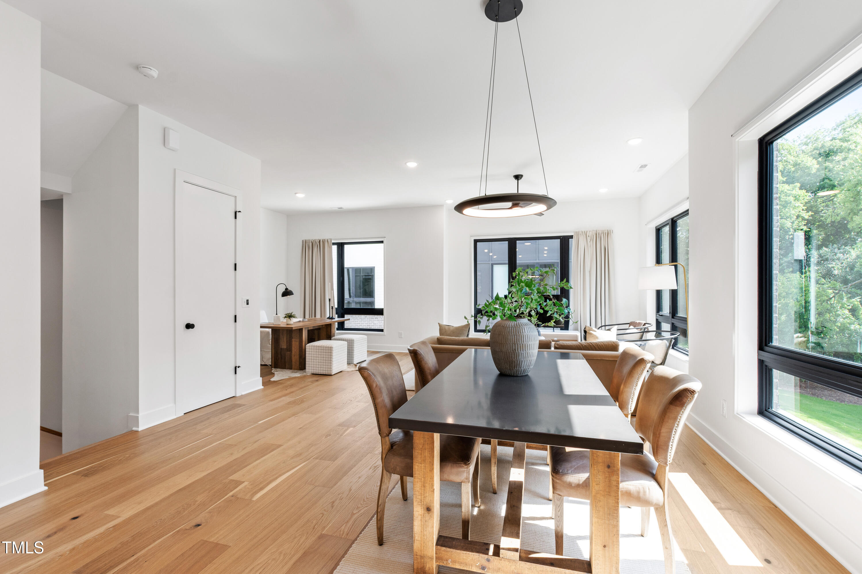 511 Edgecreek Court Raleigh, NC 27604 - Photo 28 of 58 a view of a dining room with furniture window and outside view