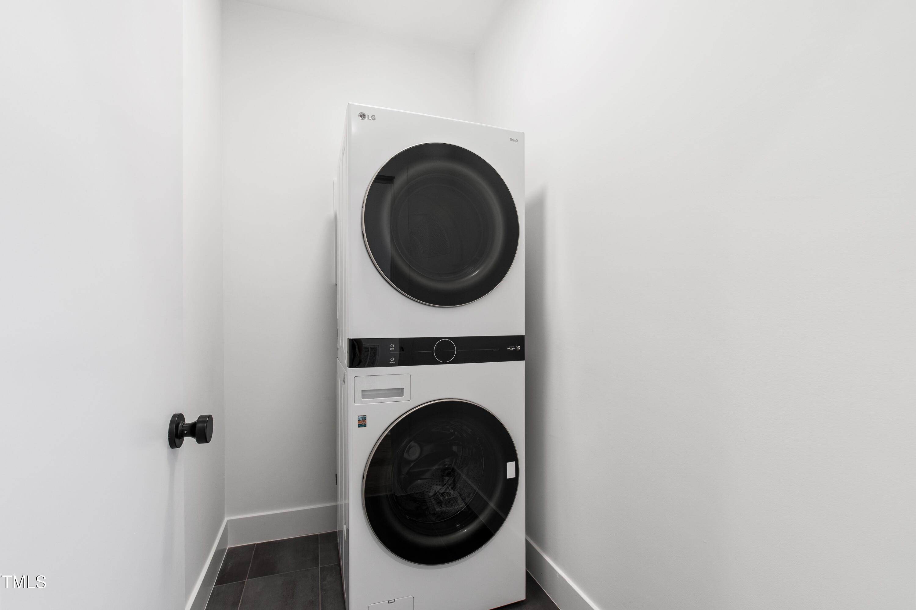 511 Edgecreek Court Raleigh, NC 27604 - Photo 30 of 58 a utility room with dryer and washer