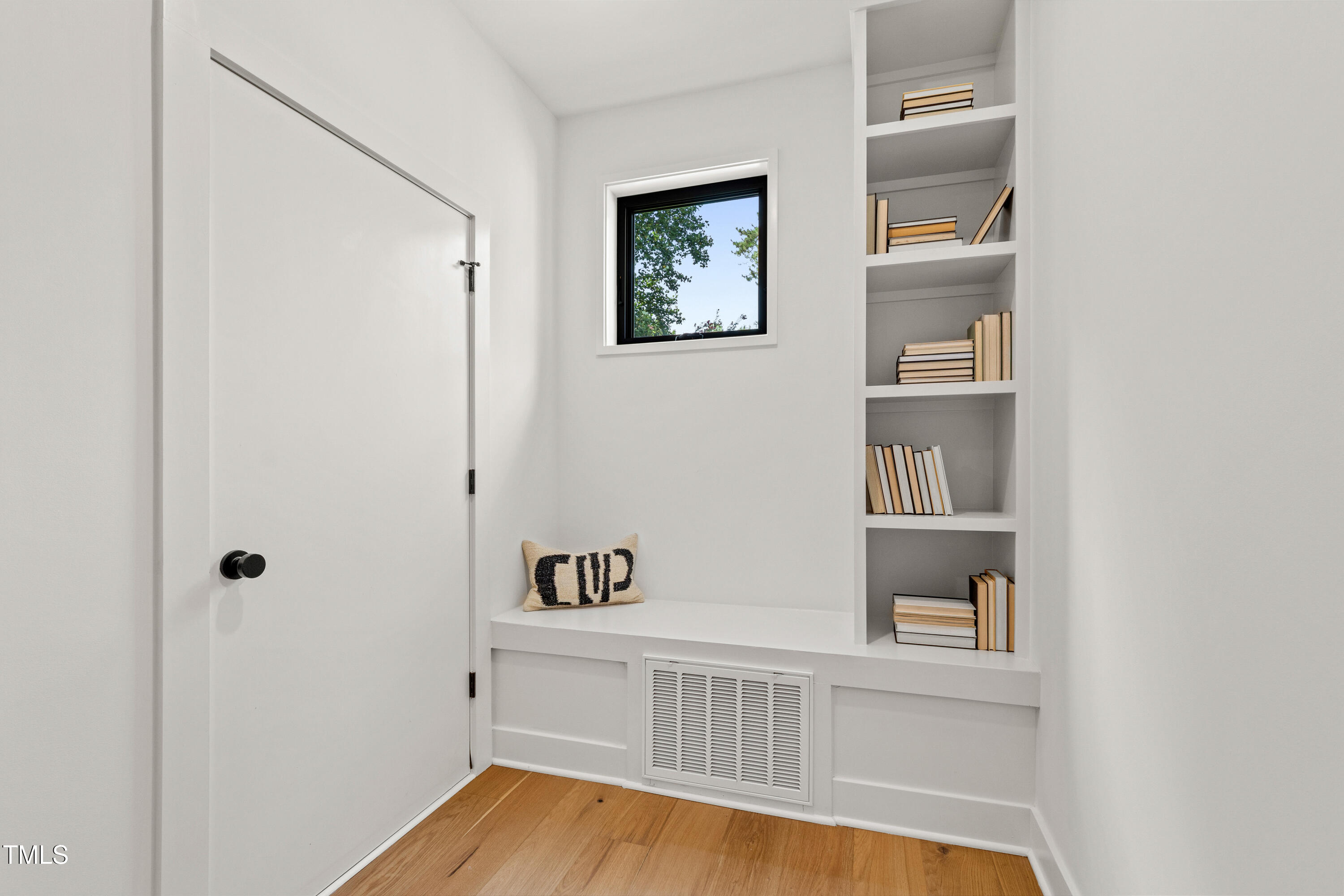 511 Edgecreek Court Raleigh, NC 27604 - Photo 4 of 58 a view of kitchen with hallway and wooden floor