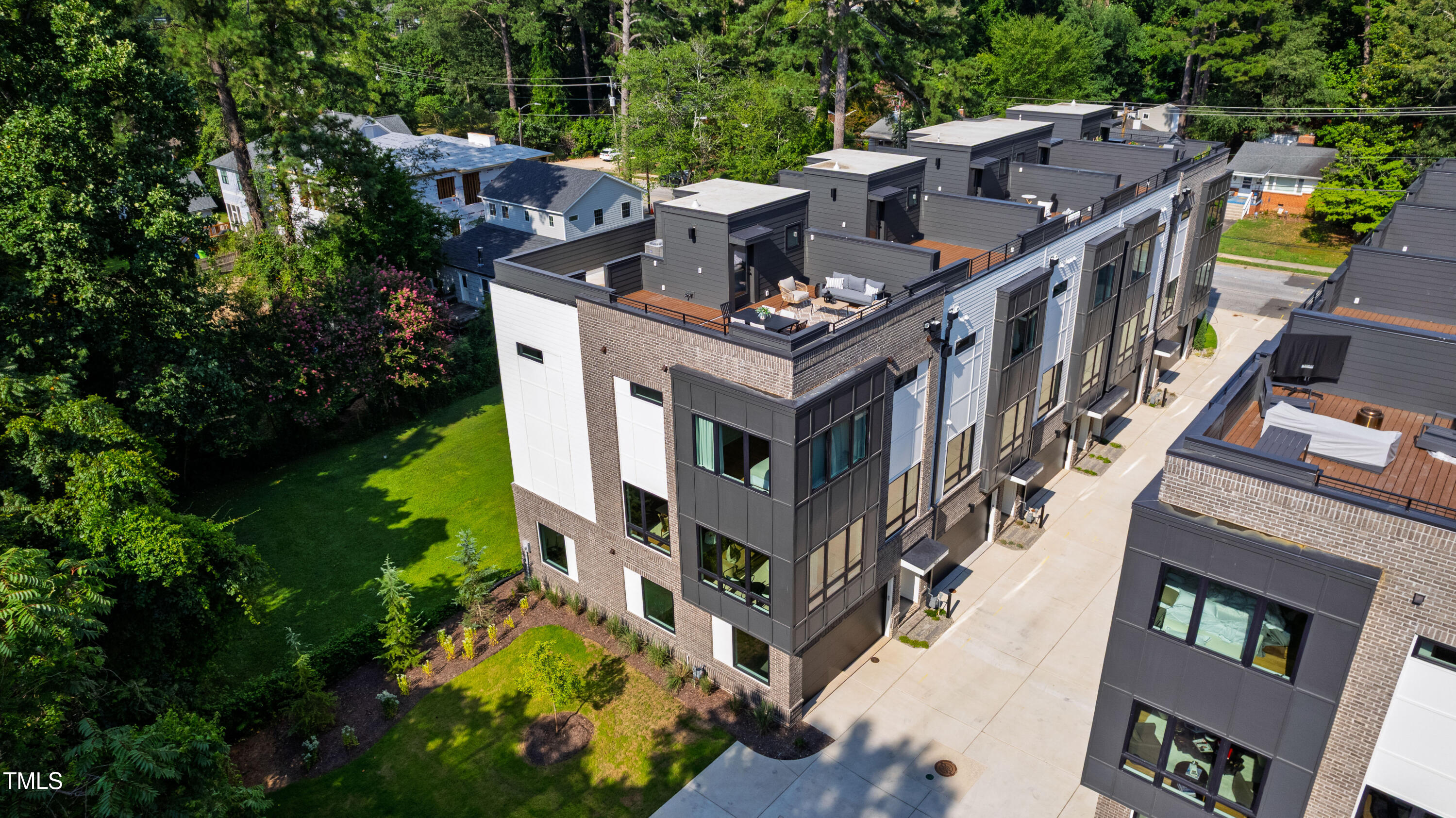 511 Edgecreek Court Raleigh, NC 27604 - Photo 50 of 58 an aerial view of a house with balcony and garden