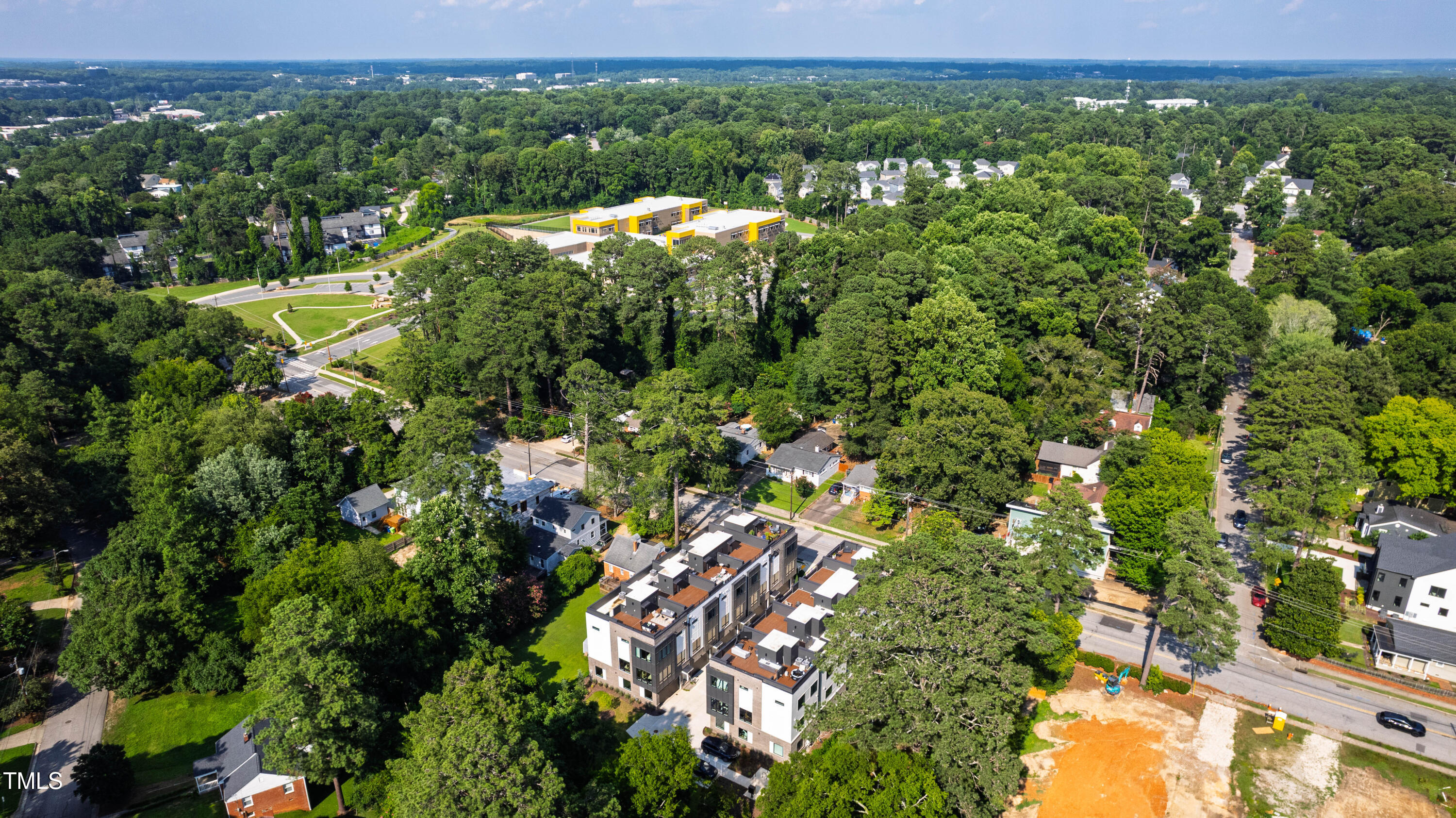 511 Edgecreek Court Raleigh, NC 27604 - Photo 51 of 58 a view of a city with lush green forest