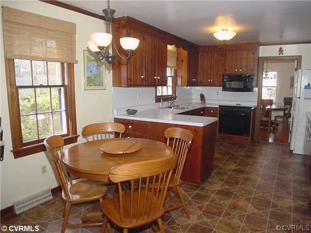 3017 Williamswood Road Richmond, VA 23235 - Photo 4 of 12 a view of a dining room with furniture and window