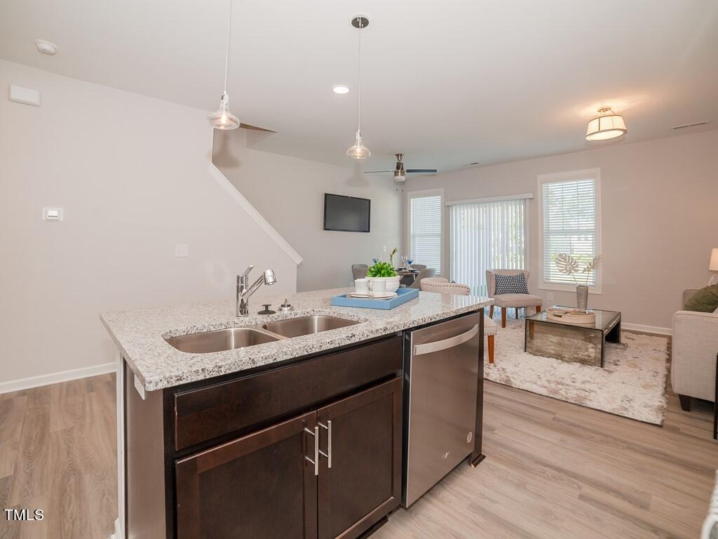 137 Rolesville Ridge Drive Rolesville, NC 27571 - Photo 7 of 17 a kitchen with a sink and stove