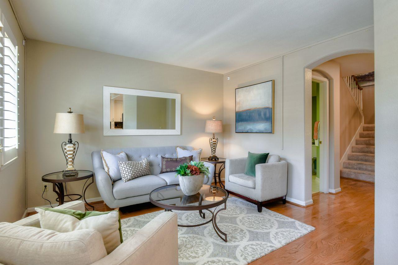 463 Mill River Lane San Jose, CA 95134 - Photo 13 of 30 a living room with furniture and a potted plant