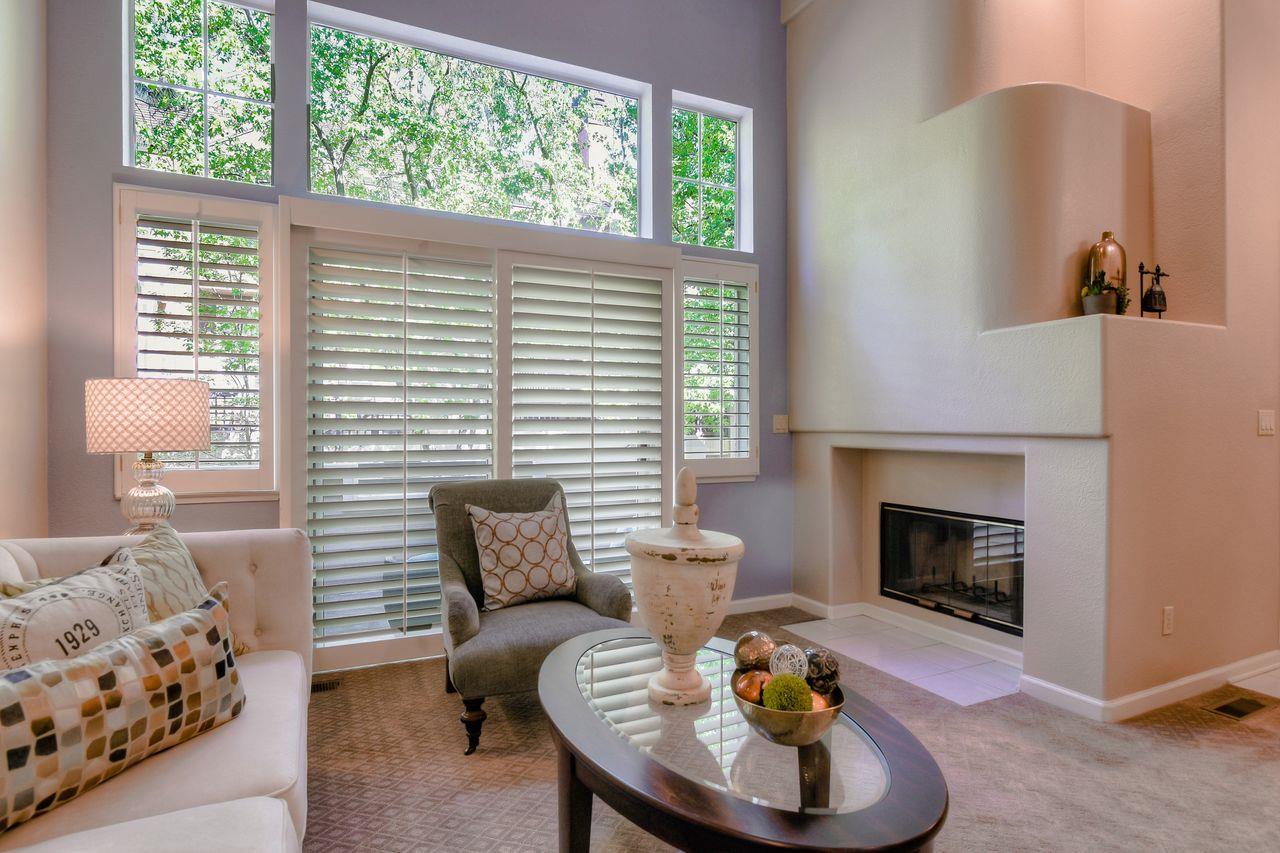 463 Mill River Lane San Jose, CA 95134 - Photo 7 of 30 a living room with furniture and a fireplace