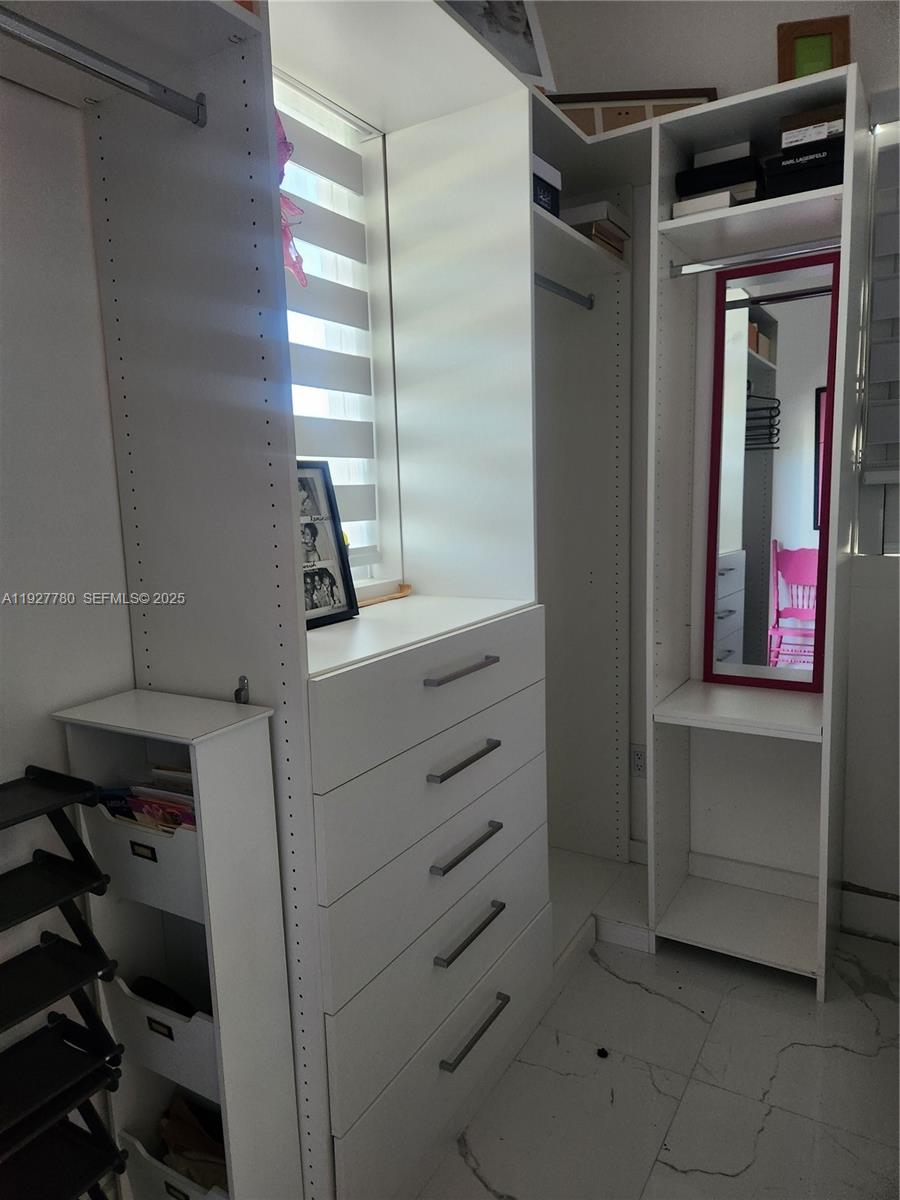 1645 Southwest 83rd Ct. Miami, FL 33155 - Photo 28 of 45 a room with storage and utility