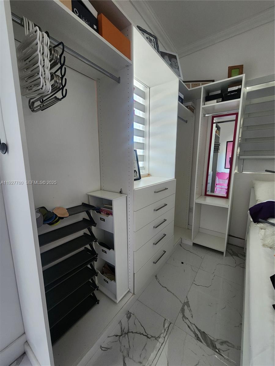 1645 Southwest 83rd Ct. Miami, FL 33155 - Photo 29 of 45 a view of walk in closet