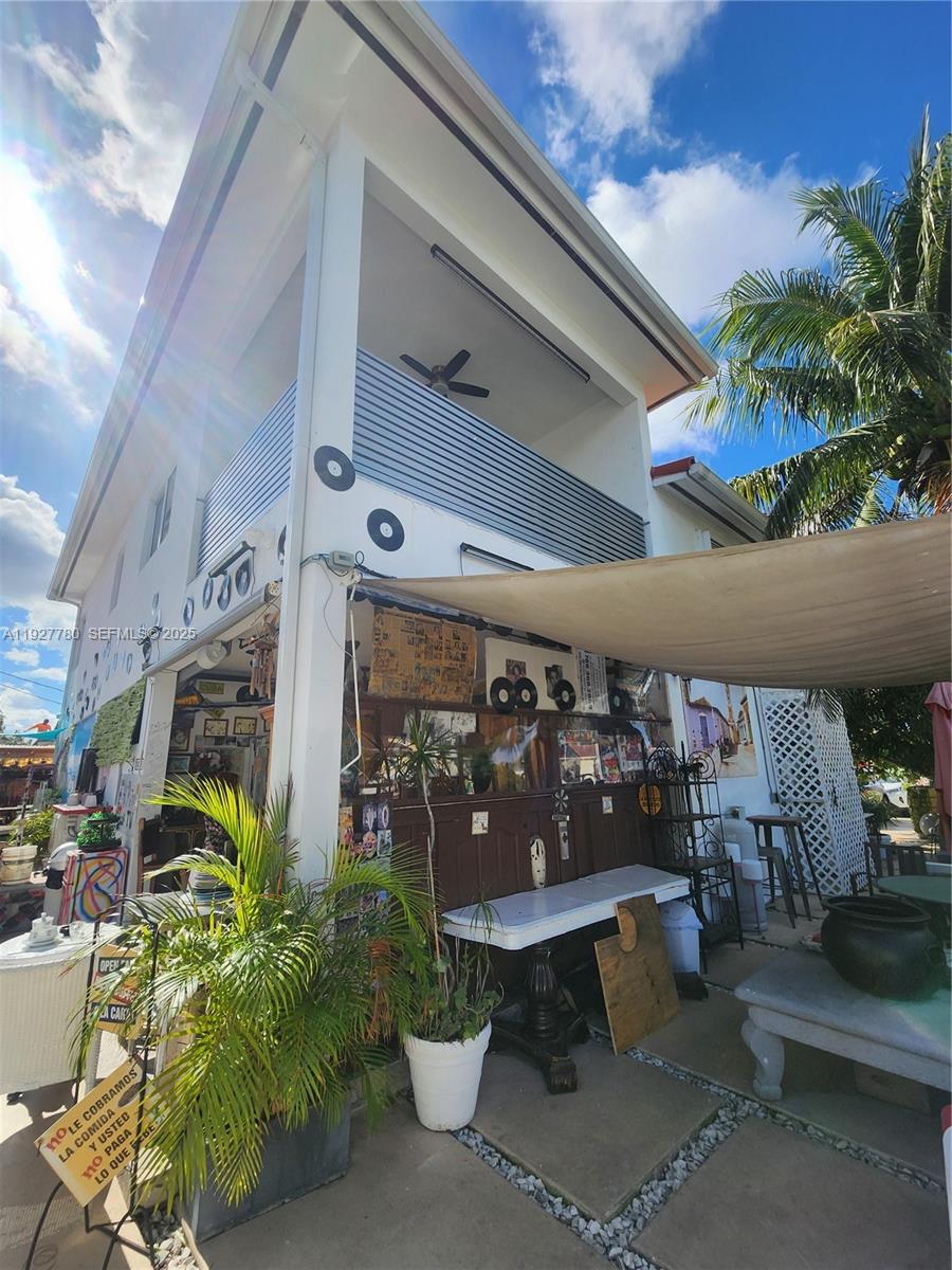 1645 Southwest 83rd Ct. Miami, FL 33155 - Photo 35 of 45 a view of store room with outdoor seating