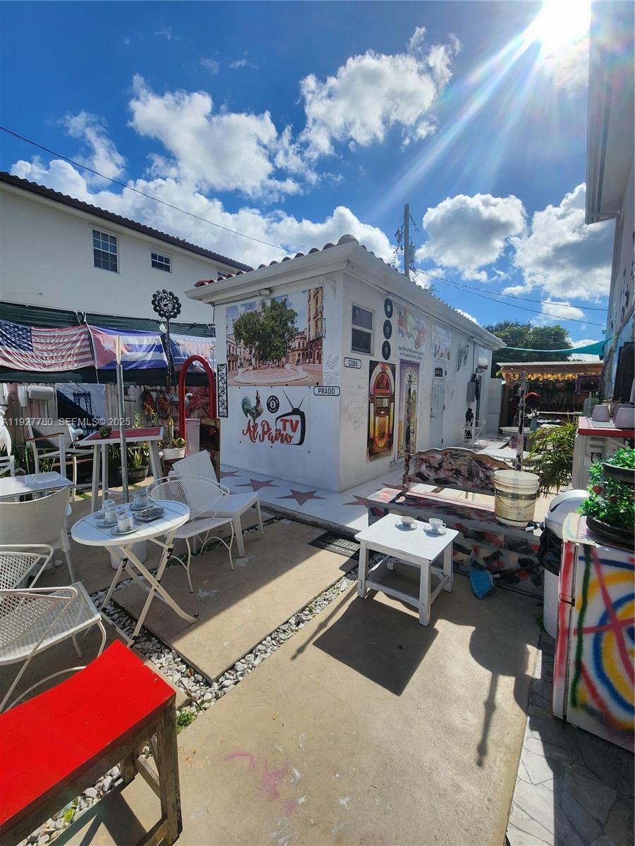 1645 Southwest 83rd Ct. Miami, FL 33155 - Photo 36 of 45 a outdoor space with furniture
