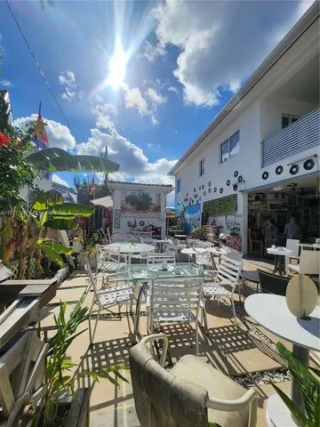 a view of a chairs and table in a room