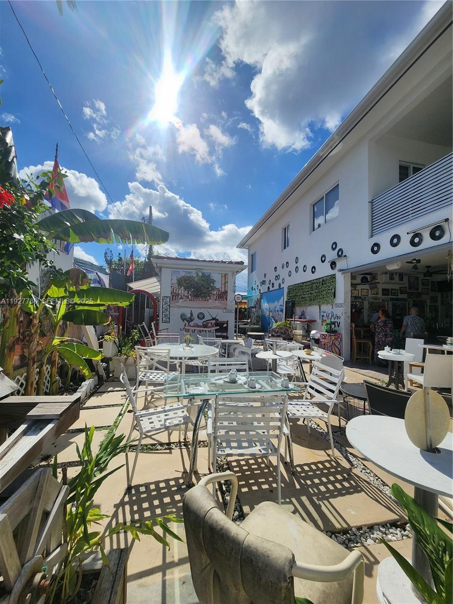 1645 Southwest 83rd Ct. Miami, FL 33155 - Photo 37 of 45 a view of a kitchen and dining room