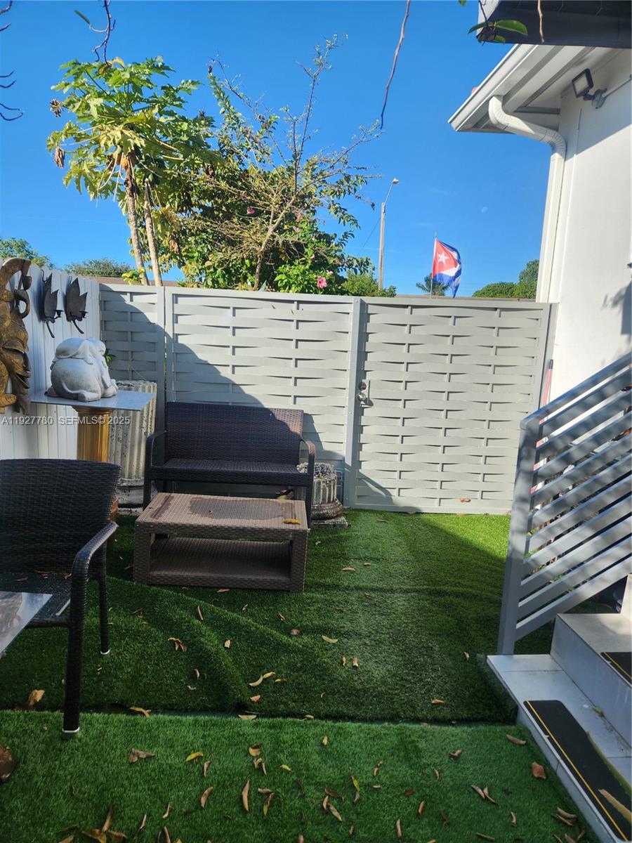 1645 Southwest 83rd Ct. Miami, FL 33155 - Photo 45 of 45 a view of a backyard with sitting area