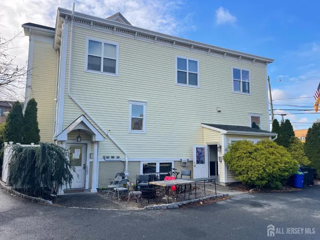 a car parked in front of a house