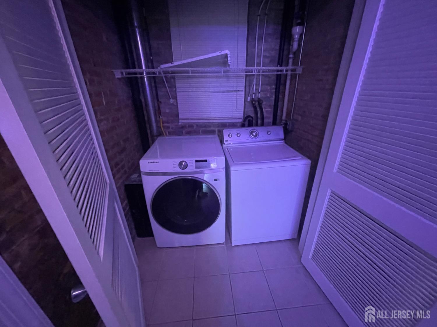 161 George Street New Brunswick, NJ 08901 - Photo 9 of 17 a utility room with dryer and washer