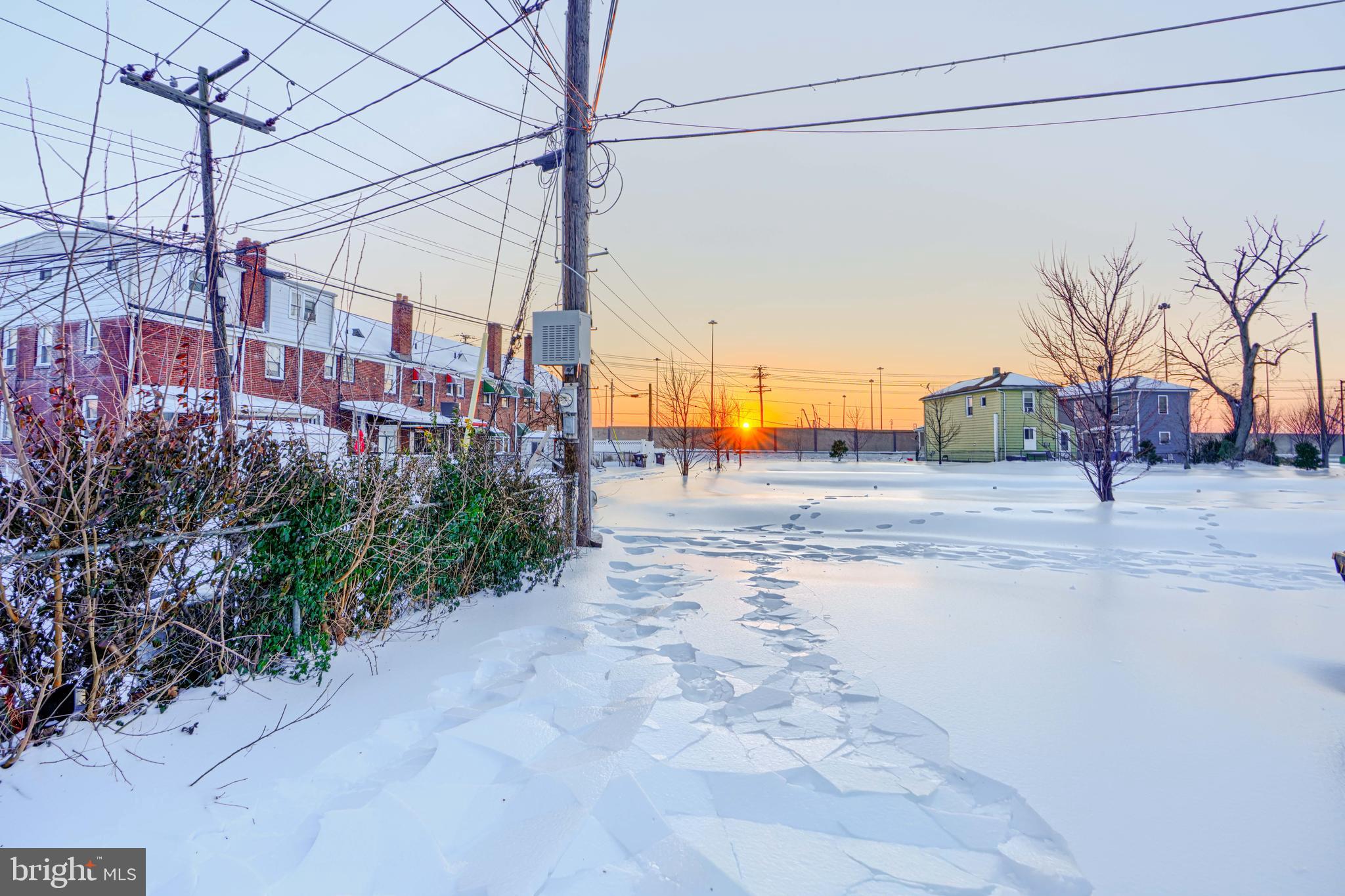402 Chestnut Court Dundalk, MD 21222 - Photo 15 of 36 a view of a street with a house in the background