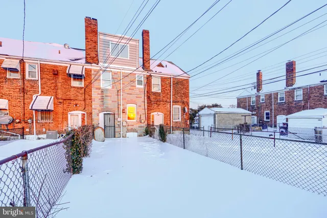 a front view of a building with glass windows