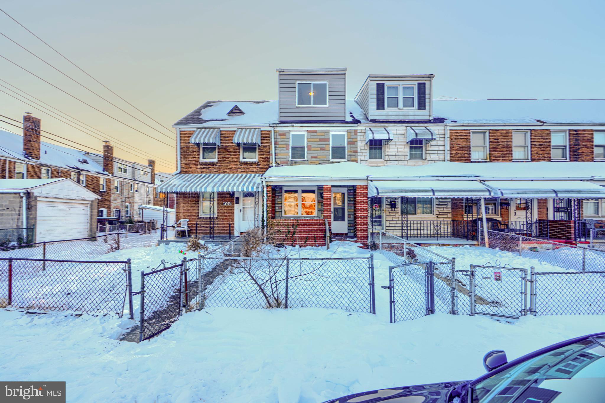 402 Chestnut Court Dundalk, MD 21222 - Photo 32 of 36 a view of a brick building with many windows
