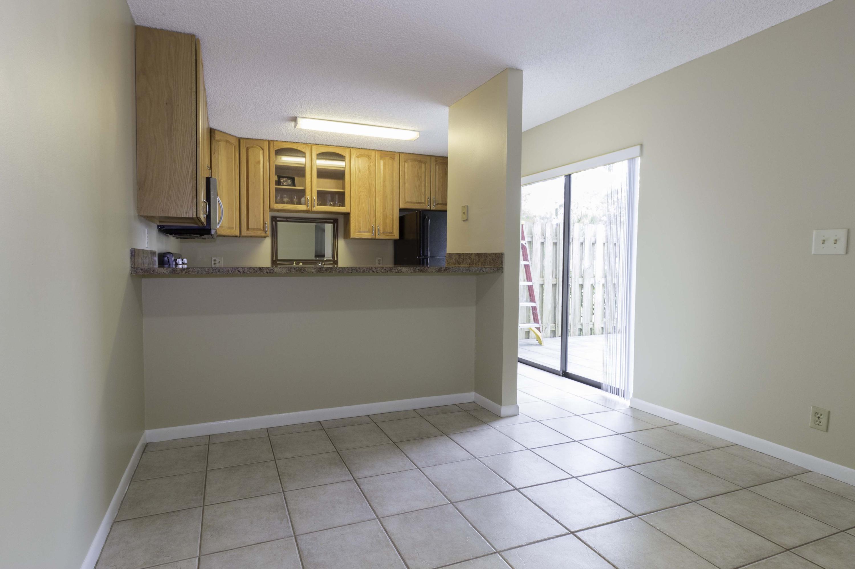 3142 Southeast Brook Street Stuart, FL 34997 - Photo 11 of 32 DiningKitchen01a