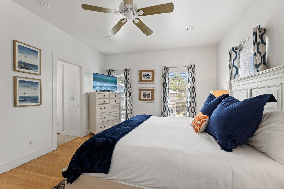 67 Snapper Street Santa Rosa Beach, FL 32459 - Photo 22 of 48 a spacious bedroom with a bed and ceiling fan