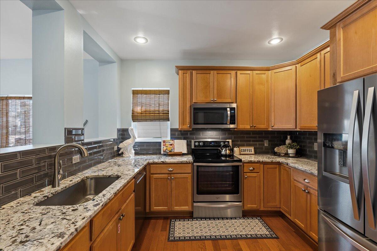 67 Snapper Street Santa Rosa Beach, FL 32459 - Photo 4 of 48 a kitchen with a sink stove and refrigerator