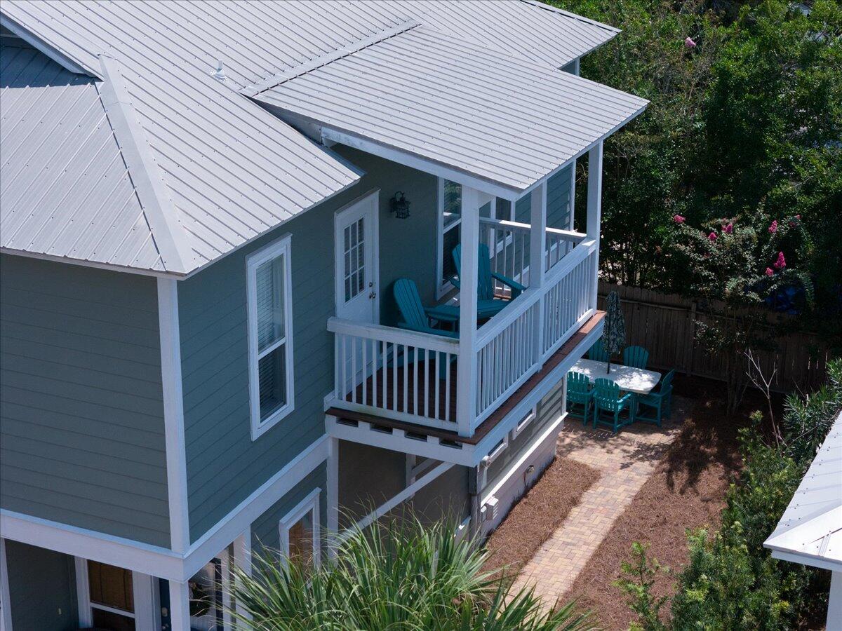 67 Snapper Street Santa Rosa Beach, FL 32459 - Photo 43 of 48 a view of backyard with deck and garden