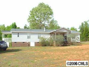 338 Tirzah Church Road Lancaster, SC 29720 - Photo 7 of 8 a front view of a house with a yard