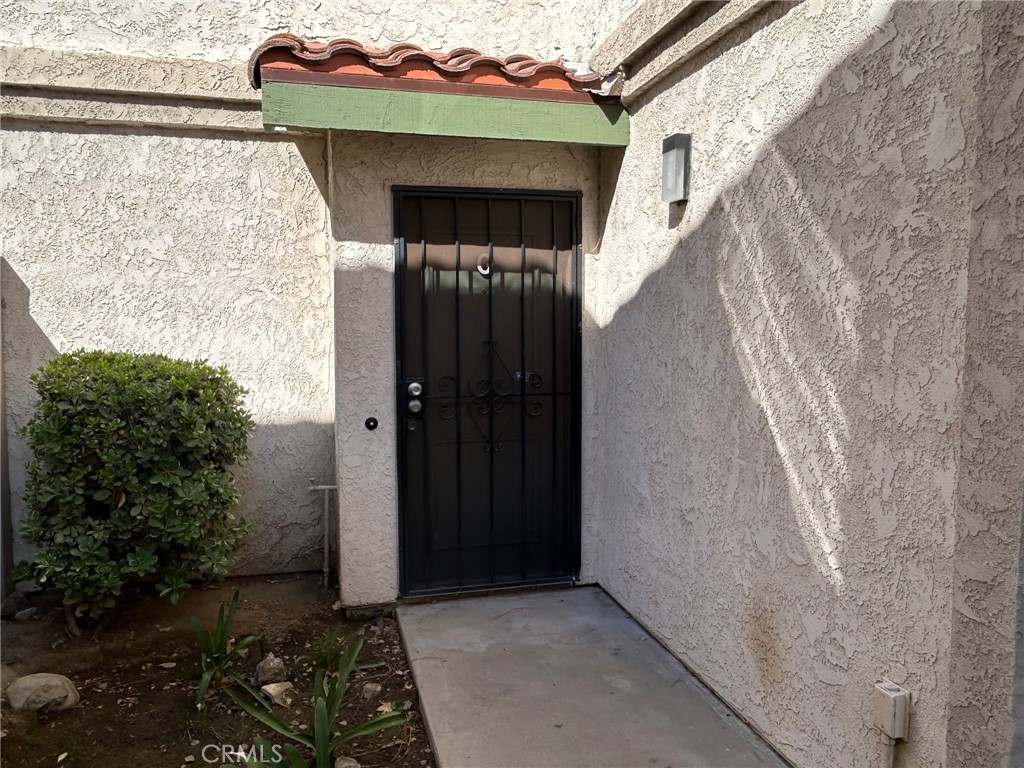 8350 Spring Desert Place, Unit G Rancho Cucamonga, CA 91730 - Photo 1 of 25 Front door