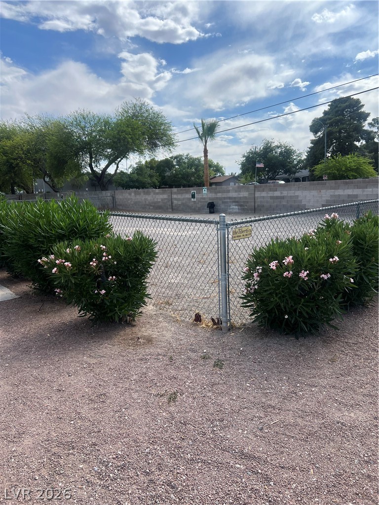 3318 North Decatur Boulevard, Unit 1174 Las Vegas, NV 89130 - Photo 20 of 23 This private yard offers a peaceful retreat with lush greenery and clear skies.