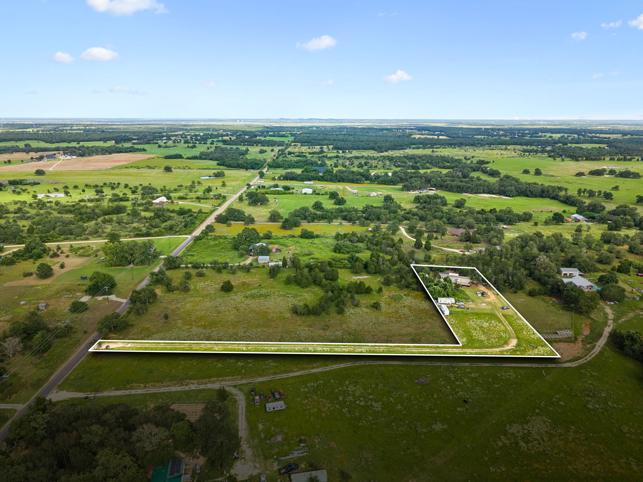 253 North County Line Road, Unit C Elgin, TX 78621 - Photo 34 of 39 Vast, open terrain offers a serene rural setting with endless possibilities.
