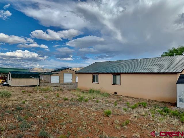 22989 Rd G.5 Cortez, CO 81321 - Photo 23 of 27 a front view of house with yard