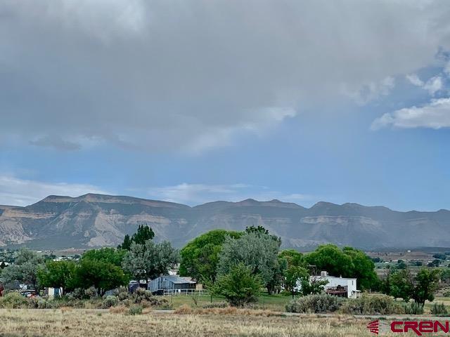 22989 Rd G.5 Cortez, CO 81321 - Photo 26 of 27 a view of a town with mountains in the background