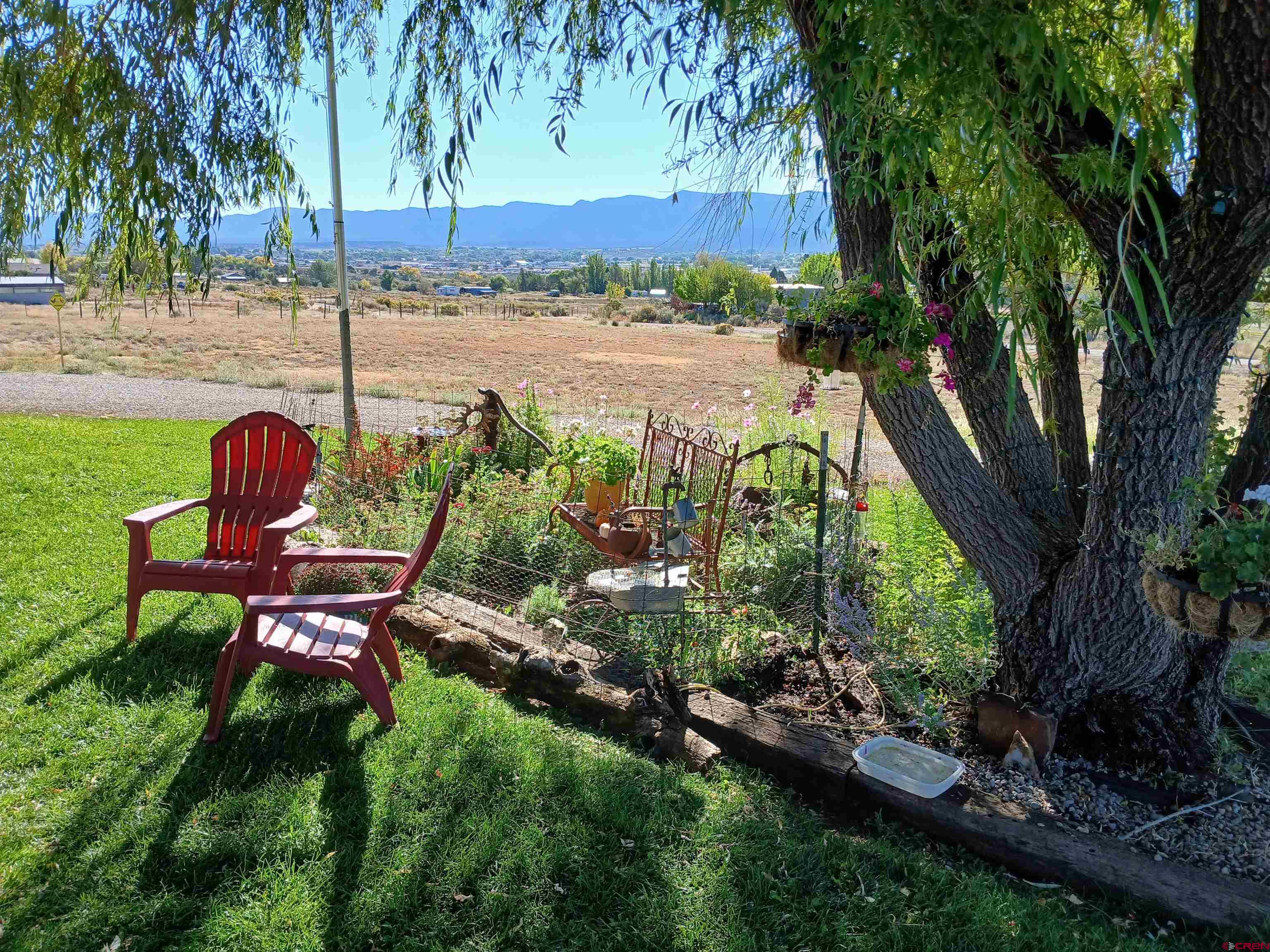 22989 Rd G.5 Cortez, CO 81321 - Photo 6 of 27 a garden view with a seating space