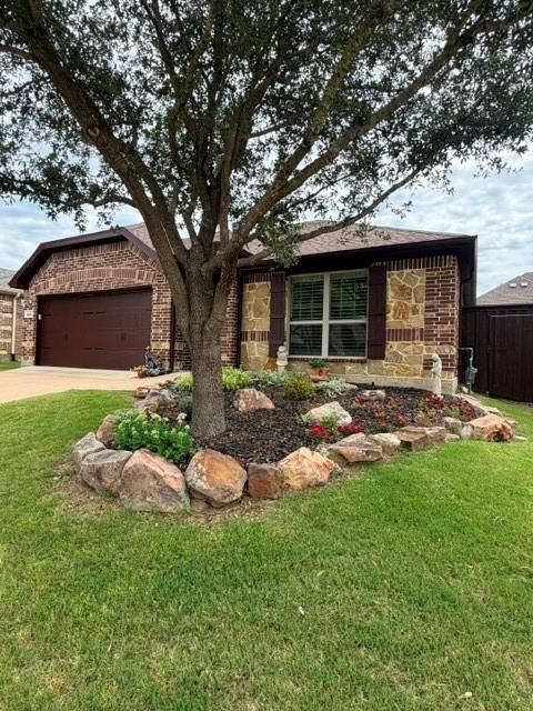 202 Tower Circle Terrell, TX 75160 - Photo 4 of 39 a view of a house with backyard sitting area and garden