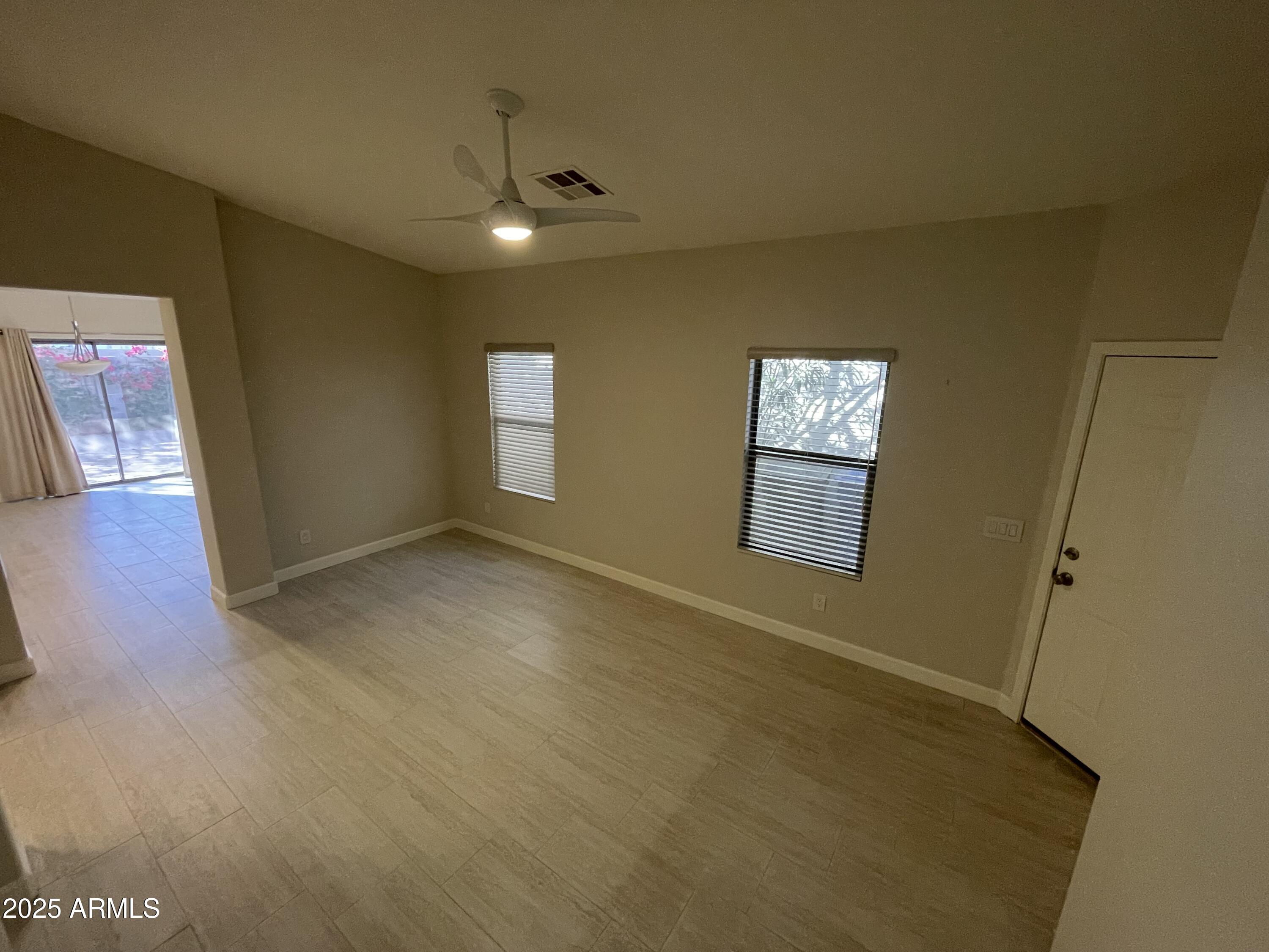 3803 West Commonwealth Avenue Chandler, AZ 85226 - Photo 5 of 15 a view of an empty room with a window