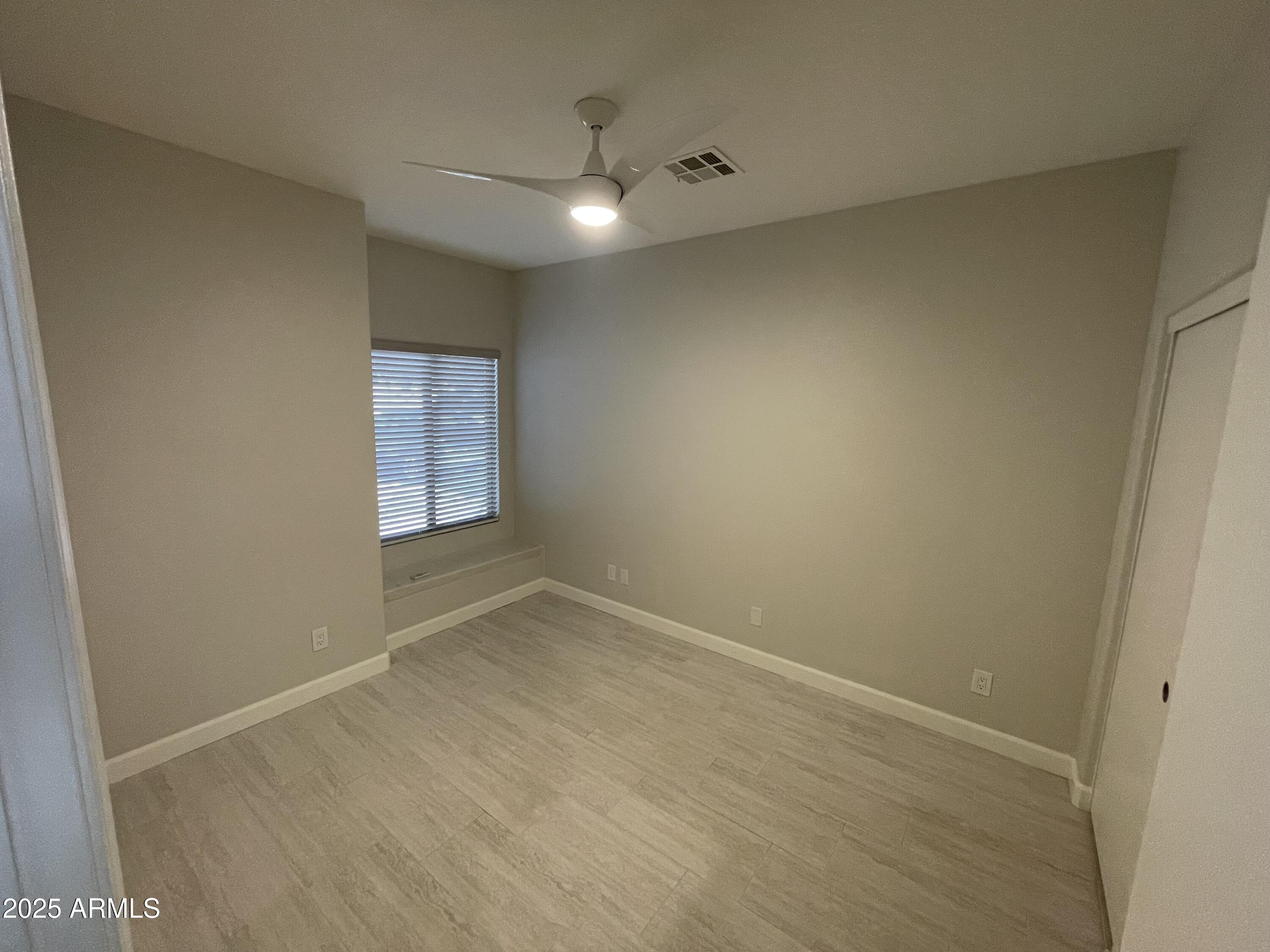 3803 West Commonwealth Avenue Chandler, AZ 85226 - Photo 8 of 15 an empty room with windows and closet