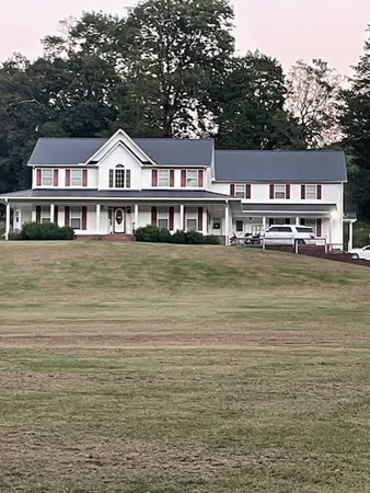 a view of a lake with a building in the background