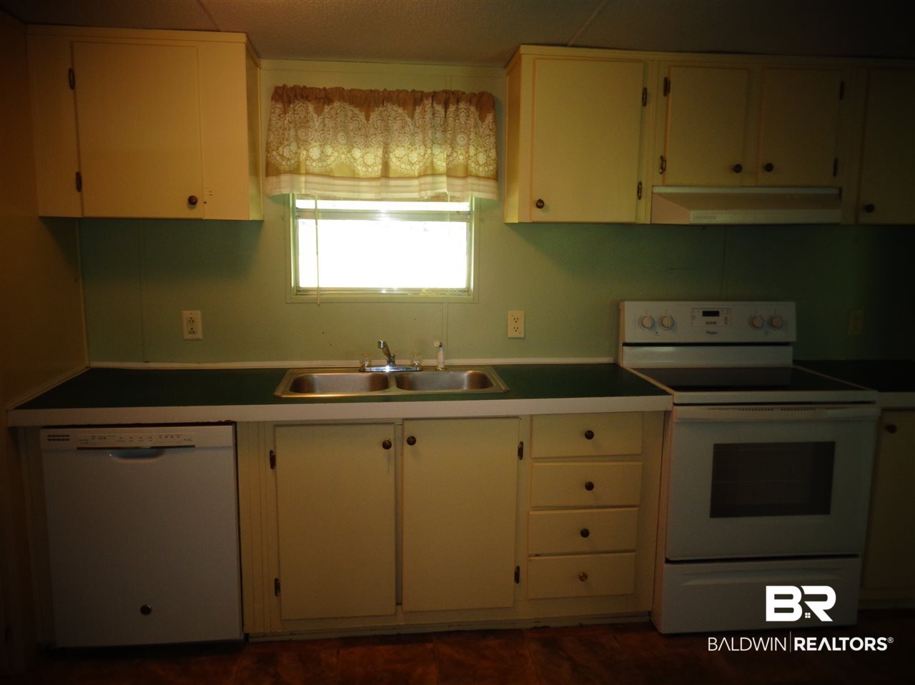 21535 A Glass And Spivey Road Robertsdale, AL 36567 - Photo 11 of 32 15x12. vinyl floor. Double stainless steel sink.