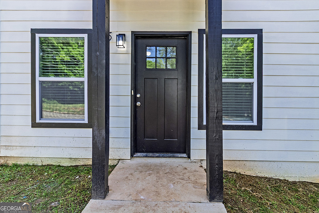 789 Main Street Macon, GA 31217 - Photo 2 of 19 a view of front door of house