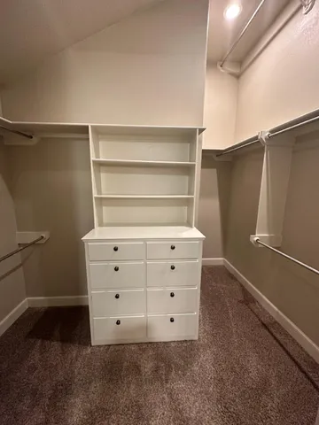 a view of an empty walk in closet