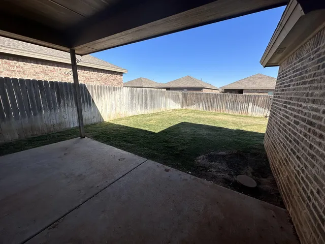a view of outdoor space and yard